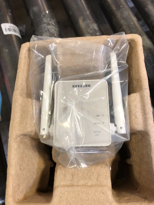 Photo 1 of NETGEAR Wi-Fi Range Extender EX6120 - Coverage Up to 1500 Sq Ft and 25 Devices with AC1200 Dual Band Wireless Signal Booster & Repeater (Up to 1200Mbps Speed), and Compact Wall Plug Design, White