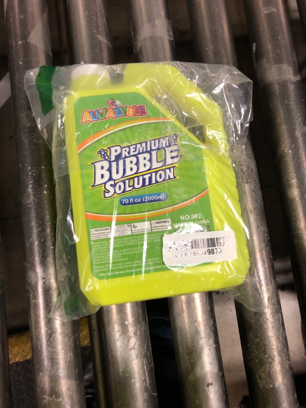 Photo 1 of Aujazyble Bubble Solution Refill - 70 Ounce Premium Bubble Liquid Refills for Bubble Machine, Wand, Gun, Blower at Wedding and Party - Bubbles Toy for Kids Toddlers Boys Girls (with Portable Handle)