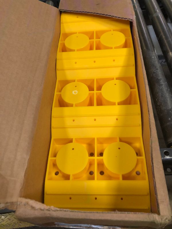Photo 1 of Camco Camper/RV Tri-Leveler - Features Durable Lightweight Trailer Ramp Design w/Non-Slip Surface & Built-in Handle - Up to 3-7/8” of Lift for RV Leveling - 3,500 lb Load Capacity (21027)