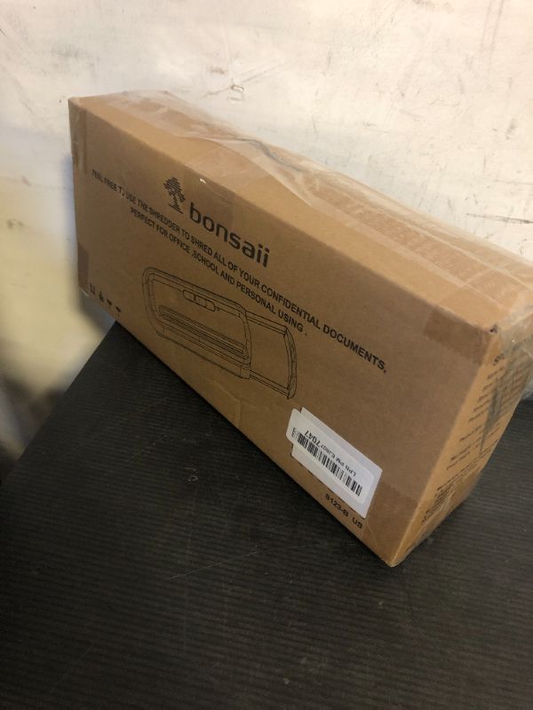 Photo 1 of Bonsaii Paper Shredder for Home Use, 6 Sheet Strip Cut Small Paper Shredder Without Basket for Home Office, Portable Shredder Extendable Arm Design with Overheat Protection (S123-B)
