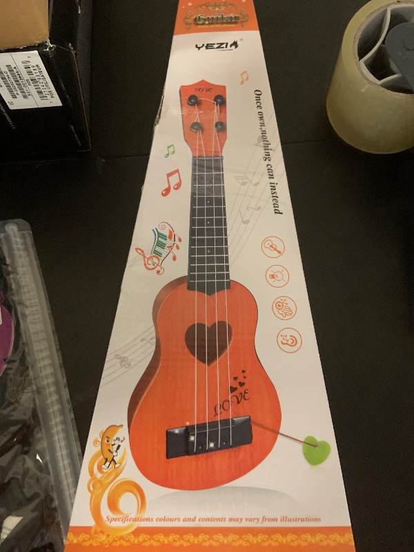 Photo 1 of YEZI Kids Toy Classical Ukulele Guitar Musical Instrument, Brown