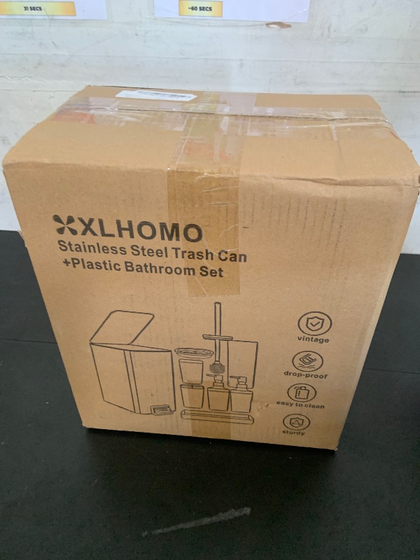 Photo 1 of XLHOMO Black Bathroom Accessories 8 Piece Black and Gold Bathroom Set, Bathroom Accessories with Stainless Steel Bathroom Trash Can,Toilet Brush,Toothbrush Set,Soap Dispenser