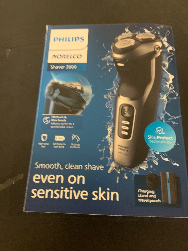 Photo 1 of Philips Norelco Shaver 3900 Series, Wet and Dry Electric Shaver, P-Cap, Travel Pouch, Charging Stand, Storm Blue, Model S3341/92