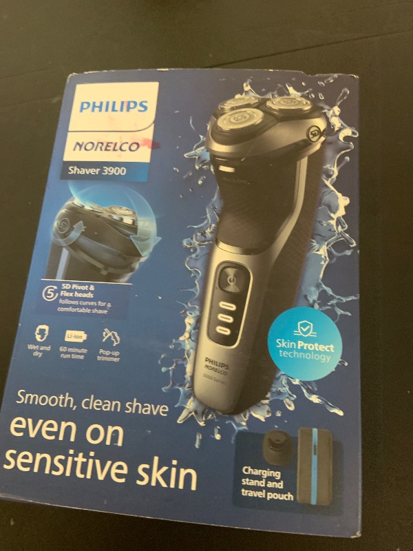 Photo 1 of Philips Norelco Shaver 3900 Series, Wet and Dry Electric Shaver, P-Cap, Travel Pouch, Charging Stand, Storm Blue, Model S3341/92