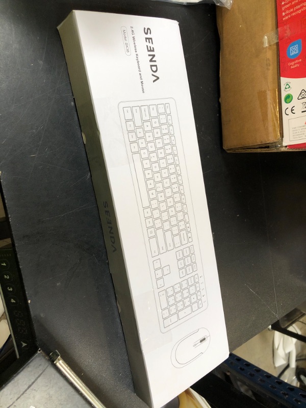 Photo 1 of Wireless Keyboard and Mouse Combo - Full Size Slim Thin Wireless Keyboard Mouse with Numeric Keypad 2.4G Stable Connection Adjustable DPI (White & Silver)