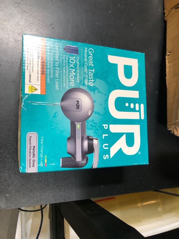 Photo 1 of PUR PLUS Horizontal Faucet Mount Water Filtration System with 3-in-1 Lead Reducing Filter for Great-Tasting Filtered Tap Water, Lasts 100 Gallons, Fits Most Kitchen or Bathroom Faucets, Metallic Grey