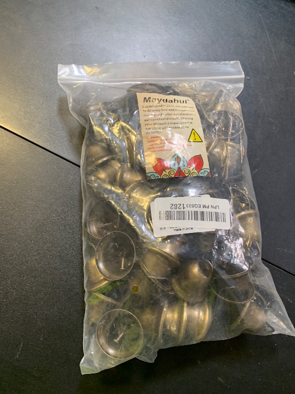 Photo 1 of Maydahui 90 PCS Bronze Jingle Bells Brass Color Vintage Small Craft Bell (1.7 X 1.5 Inches) for Wedding Doors Dog Collar Christmas Hallowmas Decor