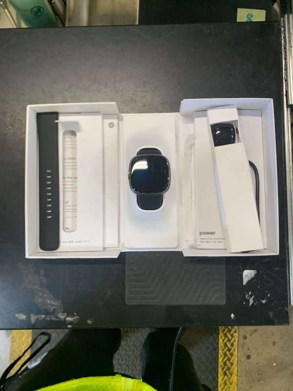 Photo 1 of Fitbit Versa 4 Fitness Smartwatch with Daily Readiness, GPS, 24/7 Heart Rate, 40+ Exercise Modes, Sleep Tracking and more, Black/Graphite, One Size (S & L Bands Included)