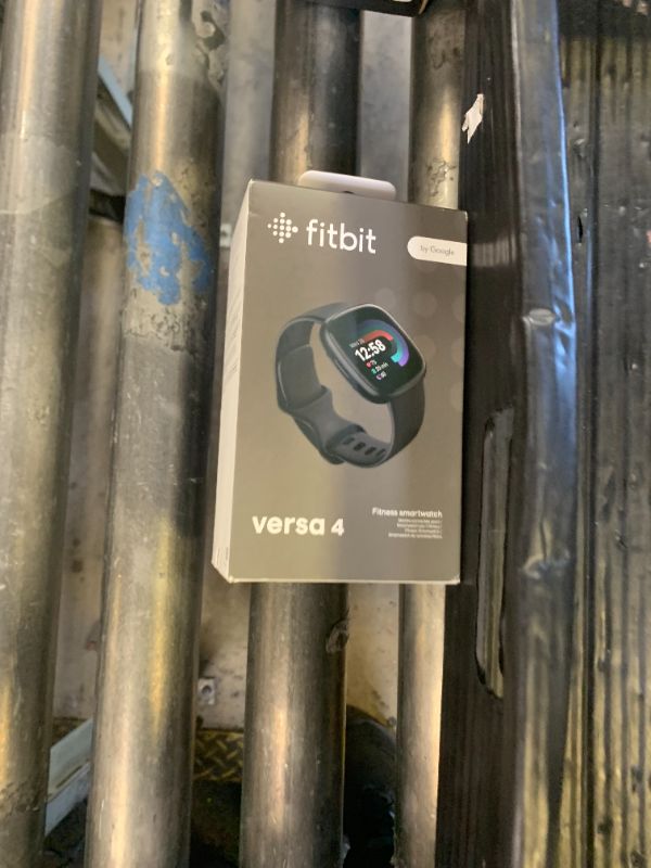 Photo 1 of Fitbit Versa 4 Fitness Smartwatch with Daily Readiness, GPS, 24/7 Heart Rate, 40+ Exercise Modes, Sleep Tracking and more, Black/Graphite, One Size (S & L Bands Included)