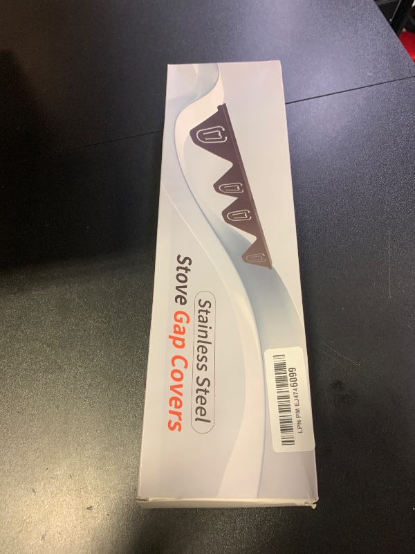 Photo 1 of Stainless Steel Stove Gap Covers (2 Pack), Upgraded Version, Stove Gap Filler, Oven Gap Filler for Kitchen Counter, Range Trim Kit, Heat Resistant, Adjustable Length 13.8” to 27.5”, Width1.3”