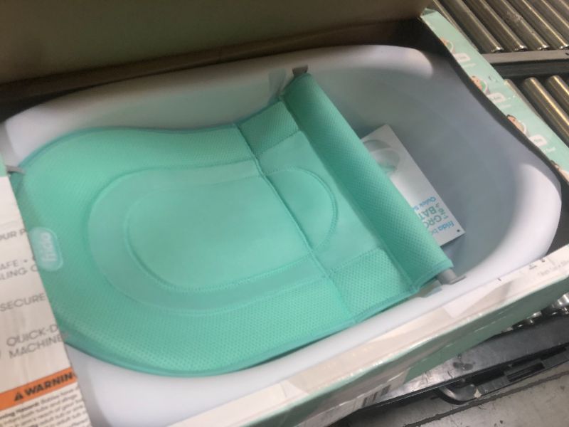 Photo 1 of Frida Baby 4-in-1 Grow-with-Me Baby Bathtub, Baby Tub for Newborns to Toddler with Removable Bath Seat & Backrest for Bath Support in Tub