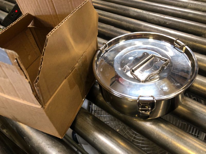Photo 1 of  stainless steel container storing food or other sensitive items. 
