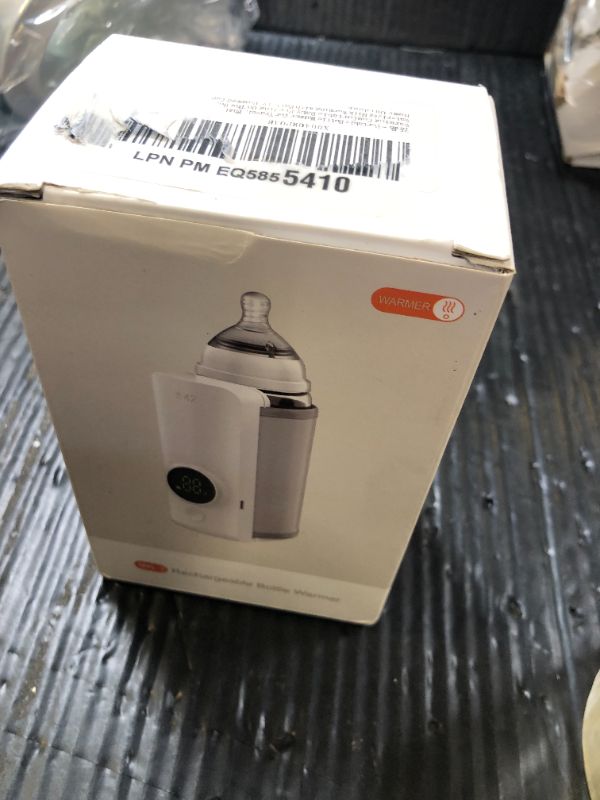 Photo 1 of Portable Bottle Warmer for Travel, Fast Warming Comfortable Baby Feeding On The Go, Waterless Milk Warming with Battery-Powered for Home Outdoor