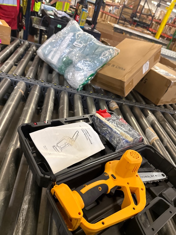 Photo 1 of livowalny mini electric chainsaw