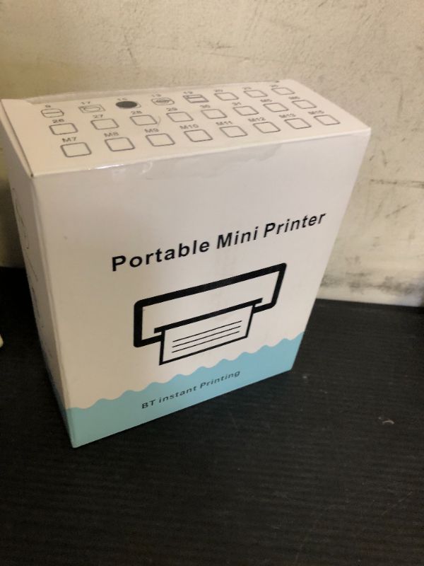 Photo 1 of HUIJUTCHEN Mini Photo Printer - Portable Pocket Sticker Printers for iPhone Thermal Printer with 10 Rolls Thermal Paper for Photo, Memo, Journal - Black