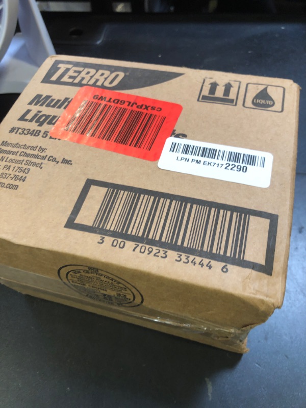 Photo 1 of TERRO Indoor Liquid Ant Baits with Adhesive Strips for Discreet Baiting - TERRO Ant Trap and Bait Station - 5 Pack, 20 Baits - T334B