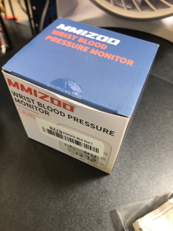 Photo 1 of MMIZOO Wrist Blood Pressure Monitor Large LCD Display BP Machine Adjustable Cuff 5.31-7.68 inch Automatic 99x2 Sets Memory with Carrying Case for Home Use (W1681)
