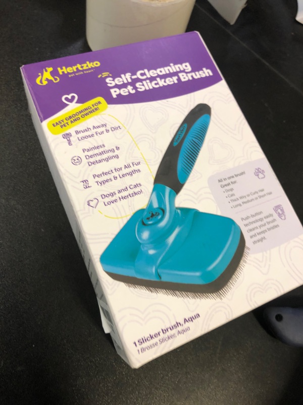 Photo 1 of Hertzko Dog Brush for Shedding - Self Cleaning Slicker Brush for Dogs and Cats - Gently Removes Loose Hair, Tangles, and Dirt - Grooming Comb Suitable for Long or Short Coats - Aqua