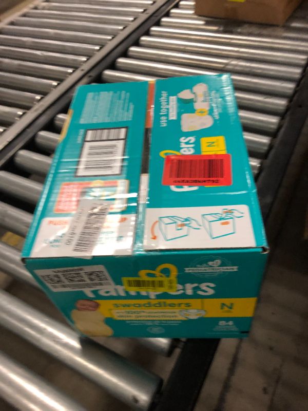 Photo 1 of Pampers Baby Diapers - Swaddlers - Size 0, 84 Count, Ultra Absorbent Disposable Newborn Diaper