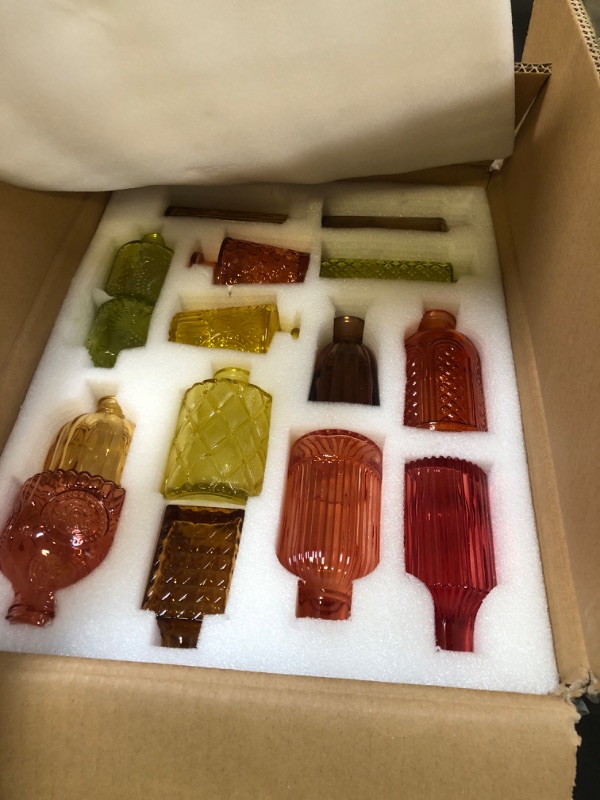 Photo 1 of Yaomiao 30 Pcs Vases Bulk Colored Flower Glass Vases Bud Vintage Colored Glass Bottles Colorful Rustic Embossed for Home Wedding Table Decorations Gifts(Orange Yellow Series)