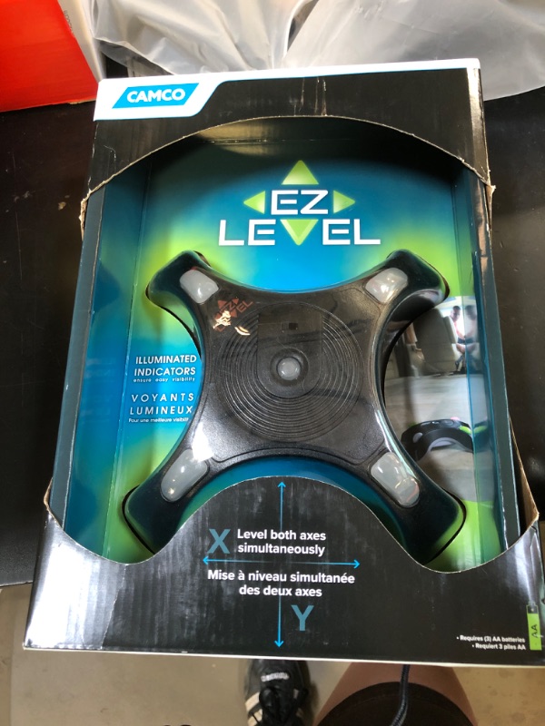 Photo 1 of Camco Camper EZ Level - RV Leveling System - Features Illuminated Indicator Lights & Automatic Shut-Off Function when Not In-Use - Includes Pre-Installed On/Off Switch (25505)