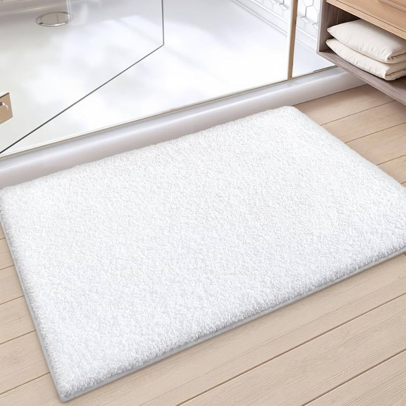 Photo 1 of white cloth bathroom mat 