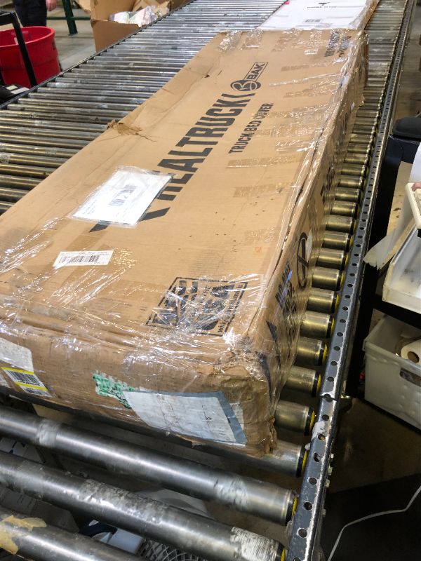 Photo 1 of RealTruck BAK BAKFlip F1 Hard Folding Truck Bed Tonneau Cover | 772130 | Fits 2019-2025 Chevy/GMC Silverado/Sierra, Works w/MultiPro/Flex Tailgate (Will not fit Carbon Pro Bed) 5' 10" Bed (69.9")