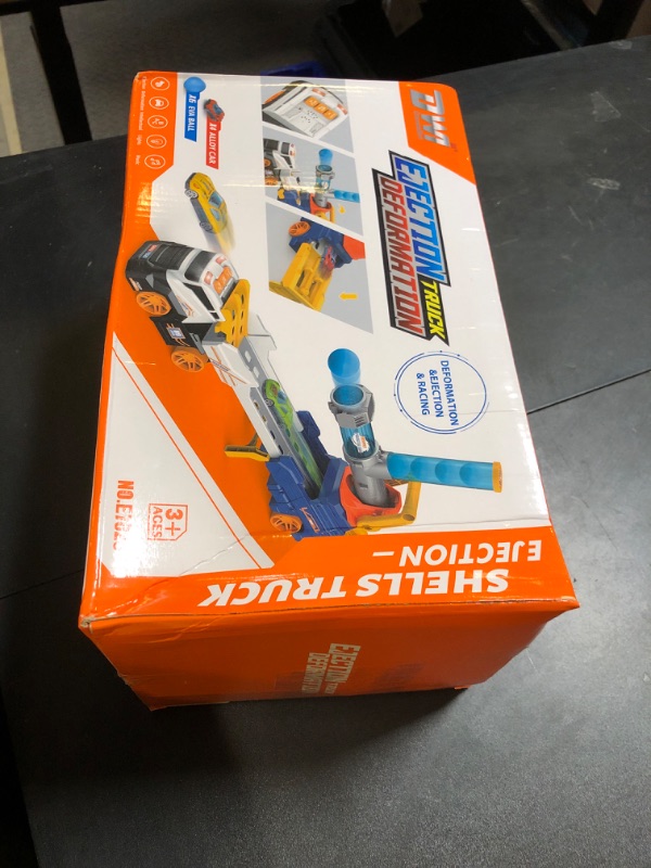 Photo 1 of Dwi Dowellin Truck Toys for Kids, 28" Large Car Toys Include 4 Race Cars+6 Soft Foam Balls, with Light & Sounds, Eejection&Shooting Transport Trucks Toy, Gifts for Boys Girls 3 4 5 6 7 8+ Year Old