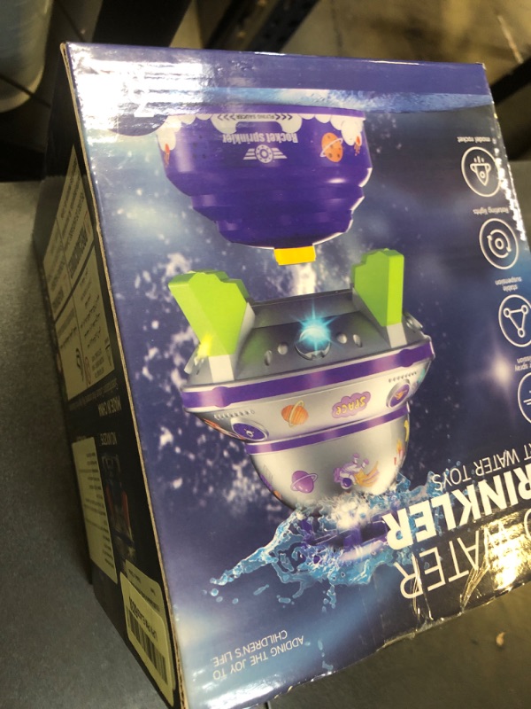 Photo 1 of COCASES Water Sprinkler for Kids, UFO Water Rocket with Light for Kid, Outdoor Summer Kids Sprinkler Water Toy Play for Yard Backyard Pool Lawn Garden Birthday Gift for Boys Girls Ages 3-12 Year Old