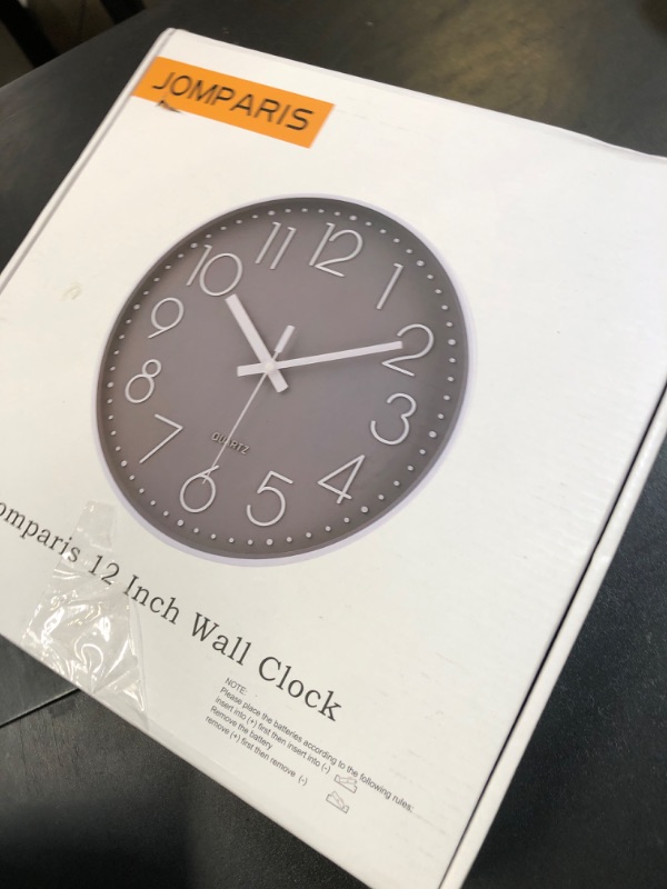 Photo 1 of jomparis Wall Clock 12 Inch Non-Ticking Silent Battery Operated Round Wall Clock Modern Simple Style Decor Clock for Home/Office/School/Kitchen/Bedroom/Living Room