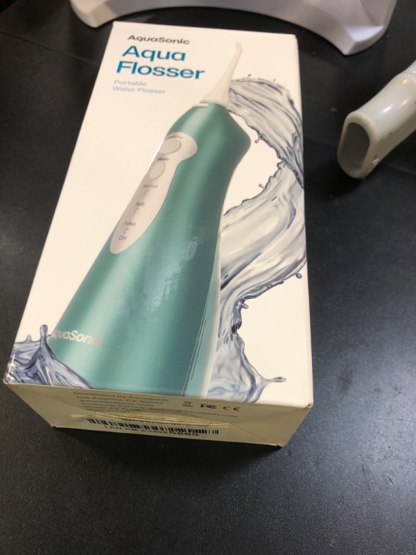 Photo 1 of AquaSonic Water Flosser - Cordless Rechargeable Water Flossers for Teeth Cleaning - Waterproof Aqua Flosser, Portable Oral Irrigator for Dental Cleaning with 5 Jet Tips – Braces Home Travel