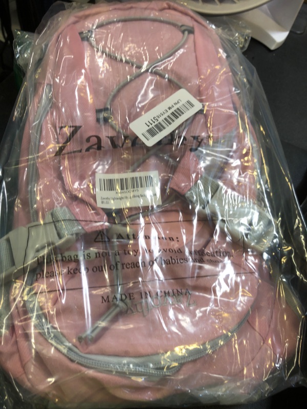 Photo 1 of Zavothy Lightweight Hydration Backpack with 2L Water Bladder for Cycling Running Biking Hiking in Pink