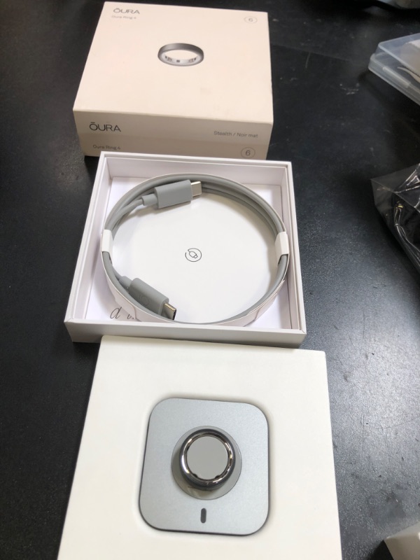 Photo 1 of Oura Ring 4 - Stealth - Size 6 - Smart Ring - Unique Sizing, Not Standard US Ring Sizes - Size First - Sleep Tracking Wearable - Heart Rate - Fitness Tracker - Up to 8 Days of Battery Life