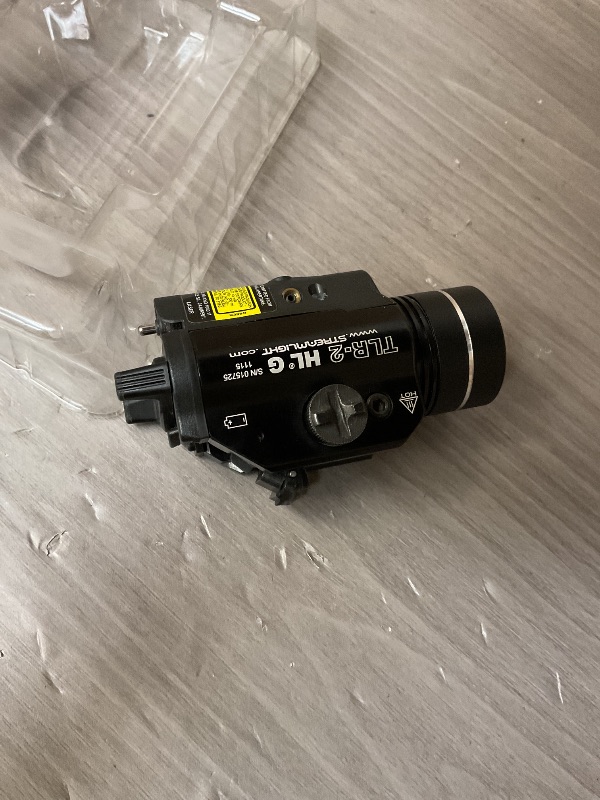 Photo 1 of Streamlight 69265 TLR-2 HL G 1000-Lumen Rail-Mounted Tactical Weapon Light with Integrated Green Aiming Laser, Includes Key Kit for Select Handguns, Black