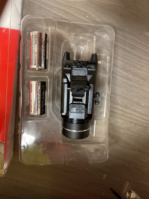 Photo 1 of Streamlight 69265 TLR-2 HL G 1000-Lumen Rail-Mounted Tactical Weapon Light with Integrated Green Aiming Laser, Includes Key Kit for Select Handguns, Black
