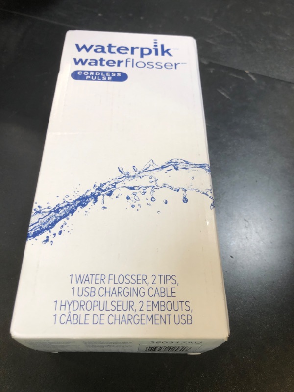 Photo 1 of Waterpik Cordless Pulse Rechargeable Portable Water Flosser for Teeth, Gums, Braces Care and Travel with 2 Flossing Tips, Waterproof, ADA Accepted, WF-20 White, Packaging May Vary