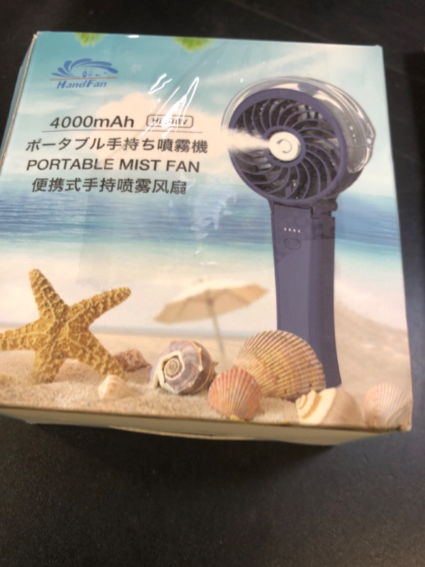 Photo 1 of HandFan 4000mAh Upgraded Handheld Misting Fan, 50ml Water Tank, Rechargeable Personal Mister Fan Portable AC, Spray Water Mist Fans, Foldable Cooling Ice Fans for Beach Travel Disney(Royal Blue)