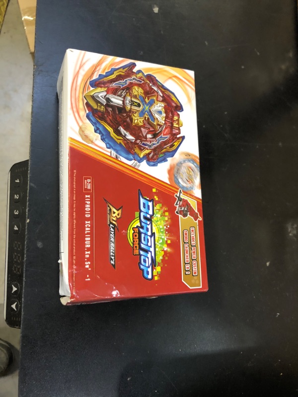 Photo 1 of Bey Battling Launcher Set, B-200 Xiphoid Xcalibur Xanthus Burst Bey, Left and Right Spin Sword Ripcord Launcher Compatible with All Bey Burst Series - Red