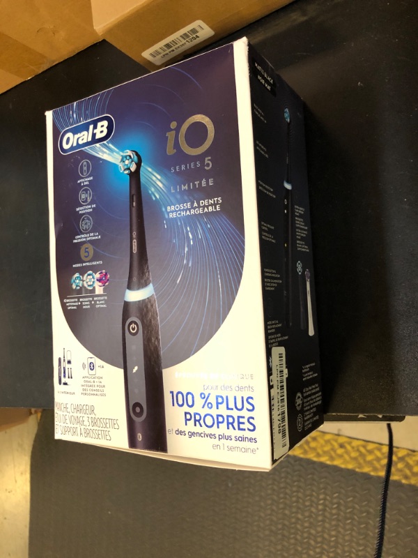 Photo 1 of Oral-B iO Deep Clean + Whiten Rechargeable Electric Toothbrush with Visible Pressure Sensor, 2 Minute Timer, 5 Cleaning Settings, 1 iO5 Limited, 3 Toothbrush Heads, Travel Case & Refill Holder, Black