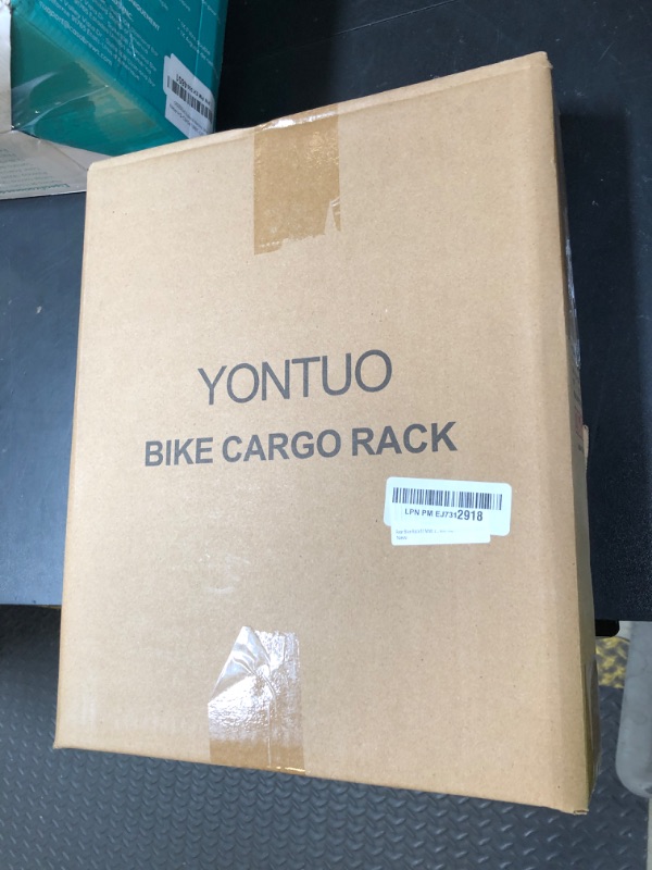 Photo 1 of YONTUO Rear Bike Rack,Bike Cargo Rack,Bicycle Pannier Rack with Reflector and Cargo Net,Height Adjustable Fit 26”-29” and 700c Bike with Non-disc Brake,BCR04