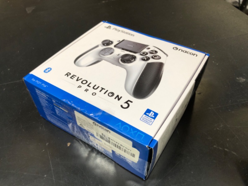 Photo 1 of NACON Revolution 5 Pro Officially Licensed PlayStation Wireless Gaming Controller for PS5 / PS4 / PC - Hall Effect, Trigger Stops, Mappable Buttons, Bluetooth Audio - White