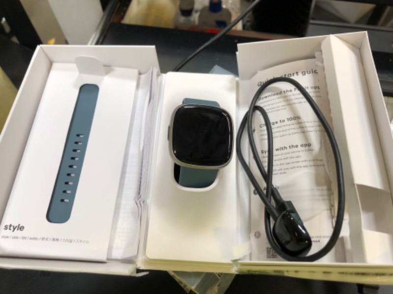 Photo 1 of Fitbit Versa 4 Fitness Smartwatch with Daily Readiness, GPS, 24/7 Heart Rate, 40+ Exercise Modes, Sleep Tracking and more, Waterfall Blue/Platinum, One Size (S & L Bands Included)