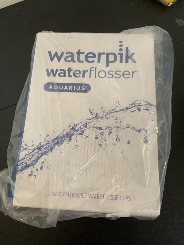 Photo 1 of Waterpik Aquarius Water Flosser For Teeth Cleaning, Gums, Braces, Dental Care, Electric Power With 10 Settings, 7 Tips For Multiple Users And Needs, ADA Accepted, White WP-660, Packaging May Vary