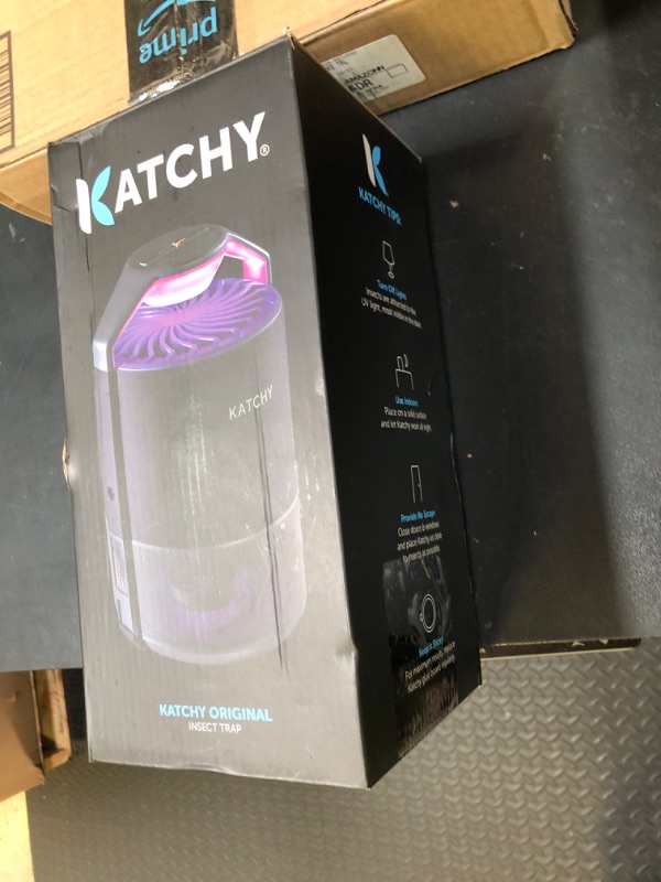 Photo 1 of Katchy Indoor Insect Trap - Catcher & Killer for Mosquitos, Gnats, Moths, Fruit Flies - Non-Zapper Traps for Inside Your Home - Catch Insects Indoors with Suction, Bug Light & Sticky Glue (Black)
