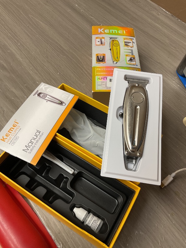 Photo 1 of SEE NOTES………KEMEI Professional Beard and Hair Trimmer for Men, Cordless T-Blade Trimmers, Electric Hair Clippers for Barbers and Stylists, All Body Grooming Model 1949