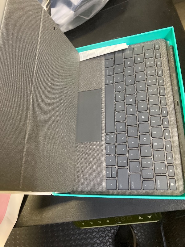 Photo 1 of Logitech Combo Touch for iPad (7th, 8th and 9th generation) keyboard case with trackpad, wireless keyboard, Smart Connector technology - Graphite