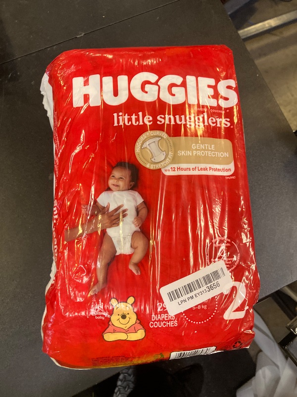 Photo 1 of Huggies Size 2 Diapers, Little Snugglers Baby Diapers, Size 2 (12-18 lbs), 29 Count, Packaging May Vary