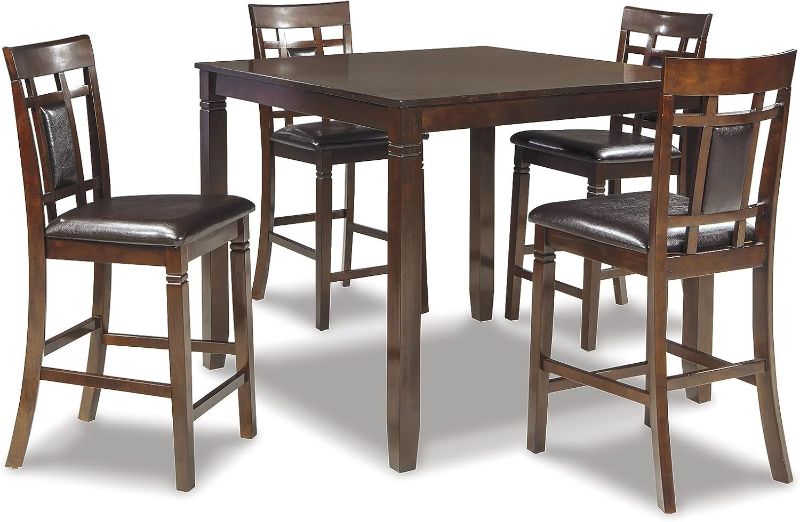 Photo 1 of Signature Design by Ashley Bennox 5 Piece Counter Height Dining Set, Includes Table & 4 Barstools, Brown
