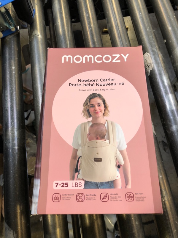 Photo 1 of Momcozy Newborn Carrier WeeSnug- Lightweight and Cozy Comfort for 7-25 lbs, Ergonomic Cross-Back Support, Effortless to Put On, Hands-Free Baby Carrier with Lumbar Support, Khaki