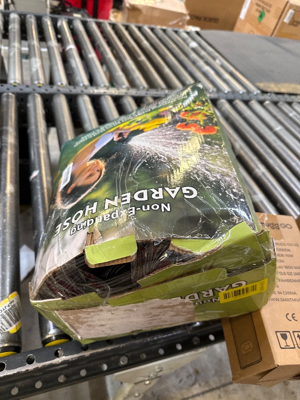 Photo 1 of Lipoliftco Garden Hose 100FT, Non-Expanding, Lightweight Hose With 8 Function Nozzle, Leak-Proof, No-Knot, Easy to Carry, Wear-Resistant, Sturdy, Flexible, 3/4GHT, Water Hose for Yard, Garden, Outdoor